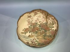 A large Japanese satsuma circular bowl, the centre decorated with ducks, signature to base, 30cm