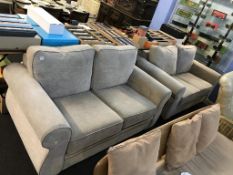 A pair of as new two seater settees