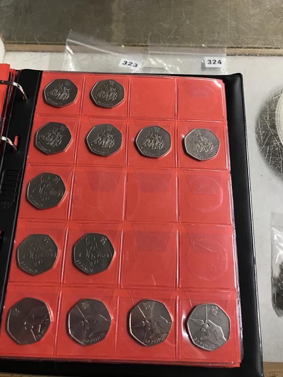 Two boxes of coins, to include eight Change Checker files of various coins, including collectors £ - Image 58 of 106