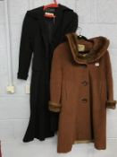 A Verner Vogue black coat, and a 1960's Travex of New York coat