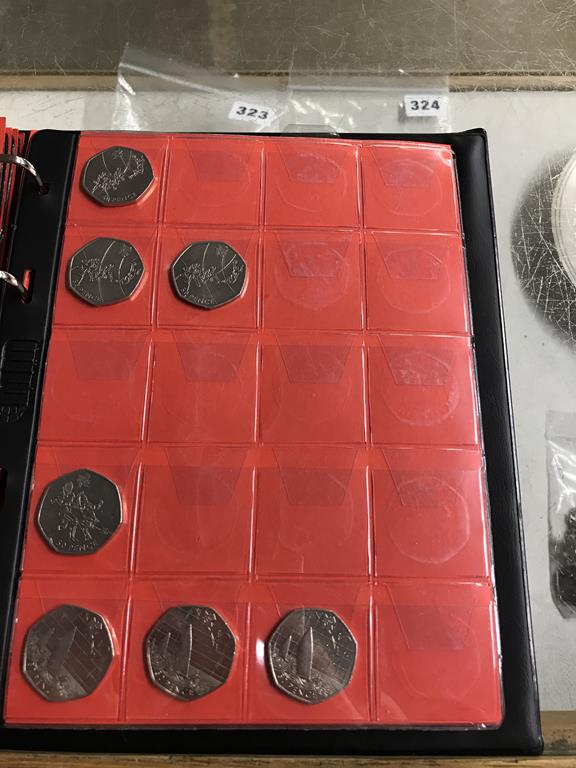 Two boxes of coins, to include eight Change Checker files of various coins, including collectors £ - Image 57 of 106