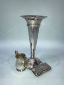 A silver spill vase, purse and jug etc.