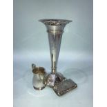 A silver spill vase, purse and jug etc.