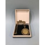 A full sovereign, dated 1904, mounted in 9ct gold, with a 9ct gold chain, weight 21g