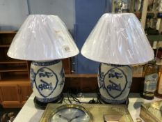 A modern pair of blue and white Chinese design table lamps