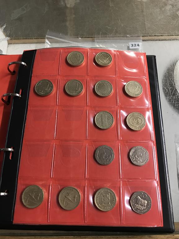 Two boxes of coins, to include eight Change Checker files of various coins, including collectors £ - Image 61 of 106