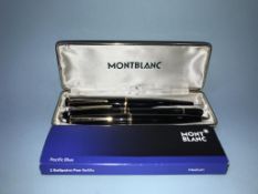 A Mont Blanc ball point pen, and a boxed set to include 14ct gold nib fountain pen, and a Mont Blanc