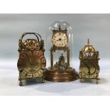 A lantern style clock and an anniversary clock