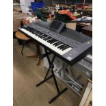 A Technics SX KN5000 keyboard and stand