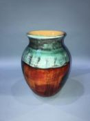 A large Poole pottery vase, 25cm height