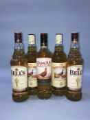 Two bottles of Bells and three bottles of Famous Grouse (5)