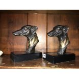 A pair of dogs head book ends