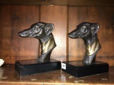 A pair of dogs head book ends