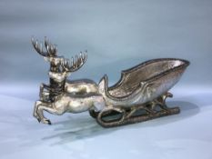 A model of Santa's sleigh with two reindeer