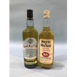 A bottle of Mackinlay's 'Shackleton' whisky, and a bottle of Ehye and Mackay 'Special reserve'