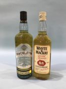 A bottle of Mackinlay's 'Shackleton' whisky, and a bottle of Ehye and Mackay 'Special reserve'