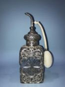 A silver mounted, cut glass scent bottle, William Comyns, London