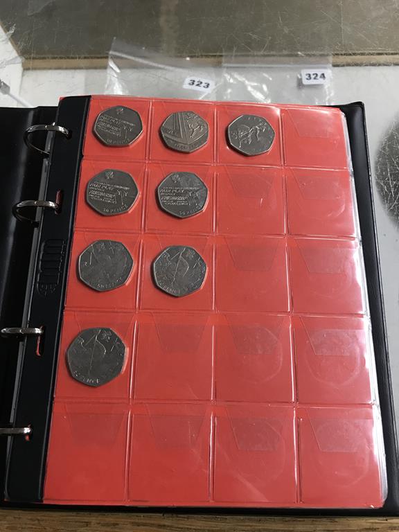 Two boxes of coins, to include eight Change Checker files of various coins, including collectors £ - Image 52 of 106