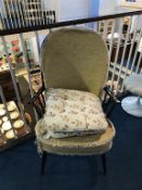 An Ercol spindle back armchair