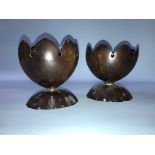 A pair of carved coconut vases, engraved with thistle heads, 12cm height