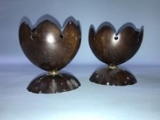 A pair of carved coconut vases, engraved with thistle heads, 12cm height
