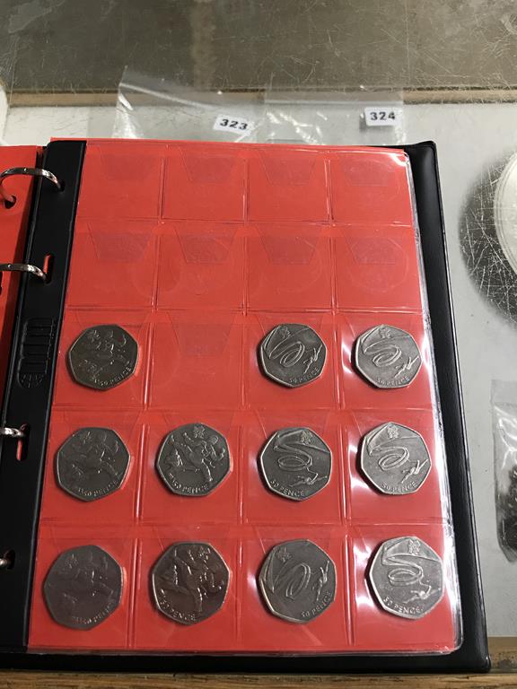 Two boxes of coins, to include eight Change Checker files of various coins, including collectors £ - Image 55 of 106