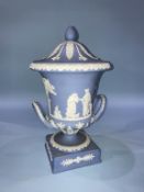 A Wedgewood blue Jasperware two handled vase and cover