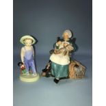 A Royal Doulton 'Golliwog', HN 2040, and a figure 'Nanny', HN 2221