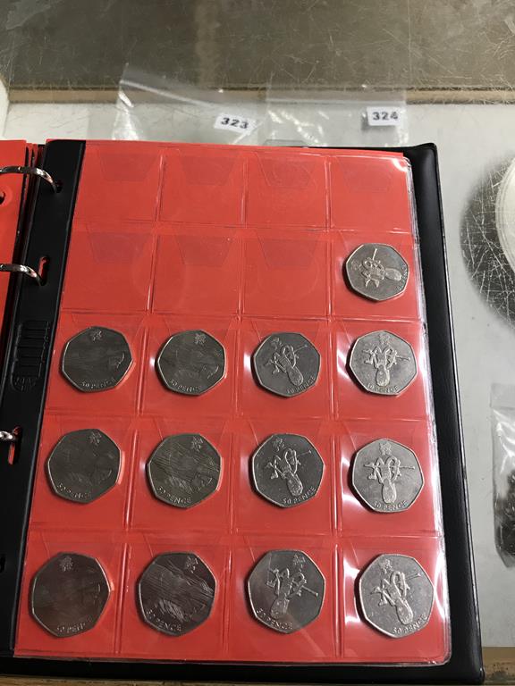 Two boxes of coins, to include eight Change Checker files of various coins, including collectors £ - Image 56 of 106