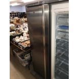 An AEG silver fridge