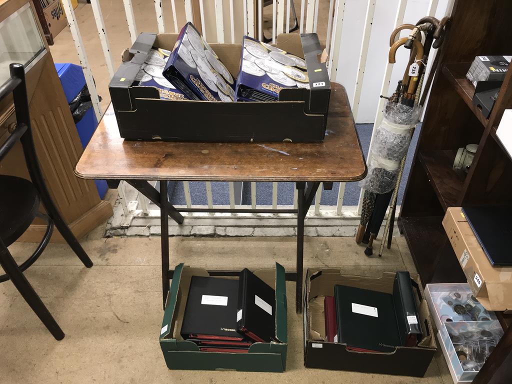 Two boxes of coins, to include eight Change Checker files of various coins, including collectors £