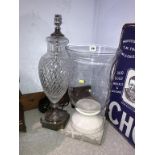 A cut glass table lamp and a hurricane lamp