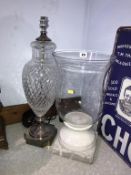 A cut glass table lamp and a hurricane lamp