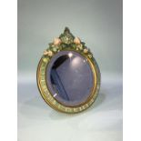 A circular Barbolla easel mirror