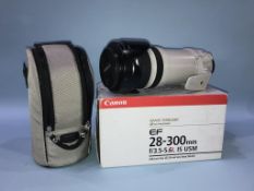 A Canon EF 28-300mm lens, SOLD AS SEEN