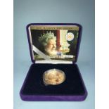 A gold proof, 2002, £5 Queen Golden Jubilee coin in case