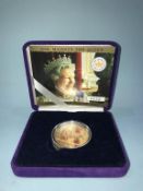 A gold proof, 2002, £5 Queen Golden Jubilee coin in case