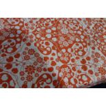 A piece of printed fabric, "Ascoli "for Sundour, orange and white floral pattern, 126cm wide x 3m