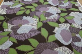 A roll of fabric, Edinburgh Weavers, "Surakata", with large stylised floral pattern in shades of