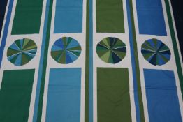 A piece of cotton fabric for Edinburgh Weavers, blue and green geometric pattern, 123cm wide x 123cm