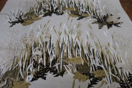 A roll of 1970s fabric, the cream background decorated with bulrushes and foliage in brown and
