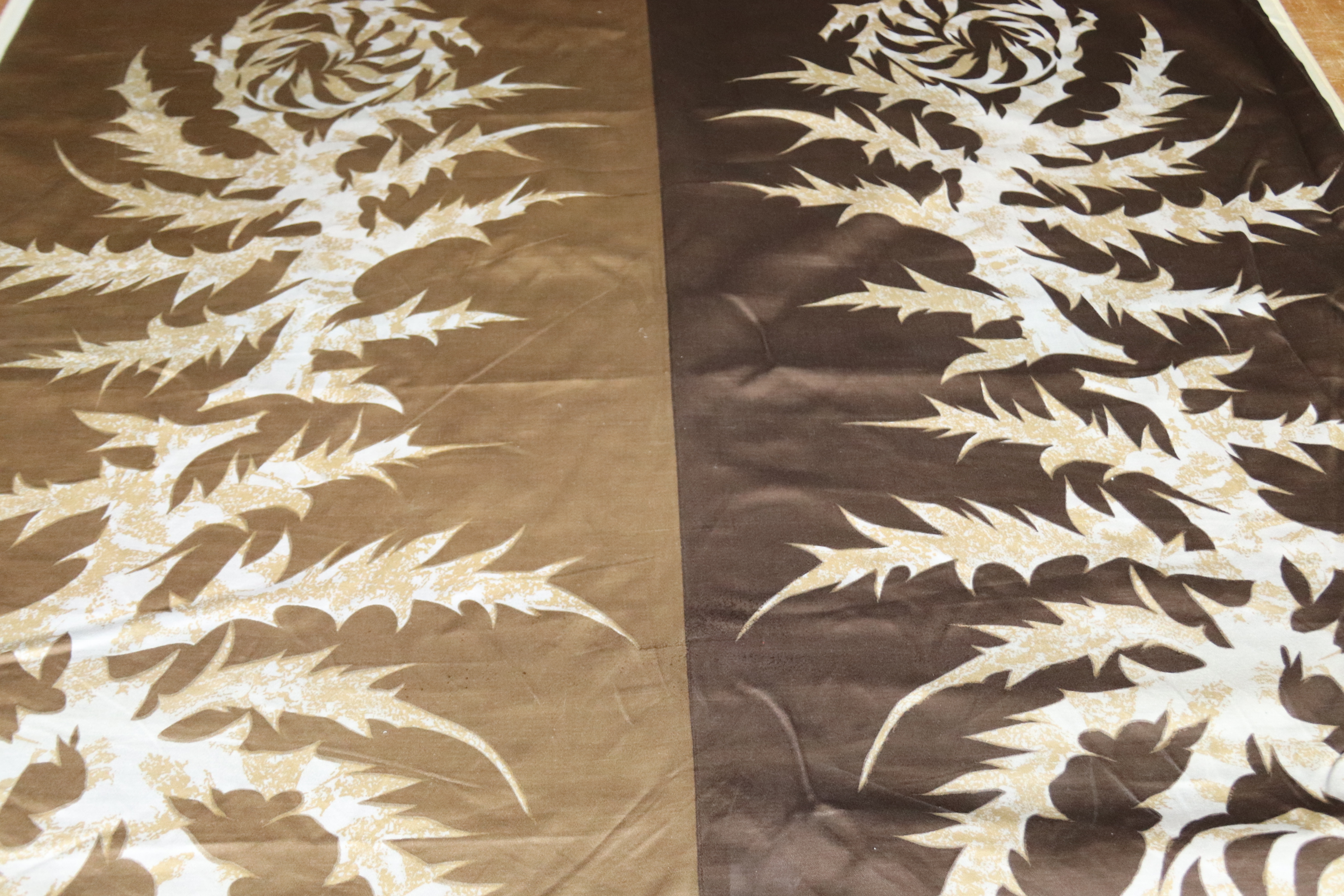 A roll of sateen finish fabric, Edinburgh Weavers, "Acanthus", having two brown bands decorated with