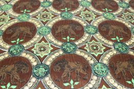 A roll of sateen fabric decorated with Lions, highlighted with vibrant green and yellow. 134cm