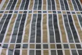 A roll of A Time Present Fabric 