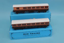 Four boxed Ace Trains railway coaches