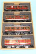 Two boxed sets of three Darstaed LMS coaches (one set with six wheels)