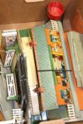 Four trains of Hornby '0' gauge tinplate railway accessories, to include cranes, goods platform,