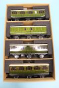 Two boxed sets of three Darstaed Southern railway coaches (one set with six wheels) (6)