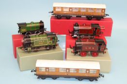Two boxed Hornby '0' gauge coaches, a boxed LMS EM320 tank locomotive, number 2270, an electric