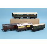 Four various boxed Darstaed railway coaches, to include a GWR 'Guard Van', Southern Parcels Van